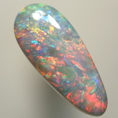 SOLID SEMI BLACK OPAL  Sparkling 3D pattern with reds, orange and green turquoise. SEE VIDEO